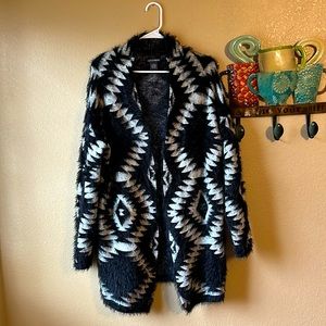 Chelsea & Theodore eyelash cardigan